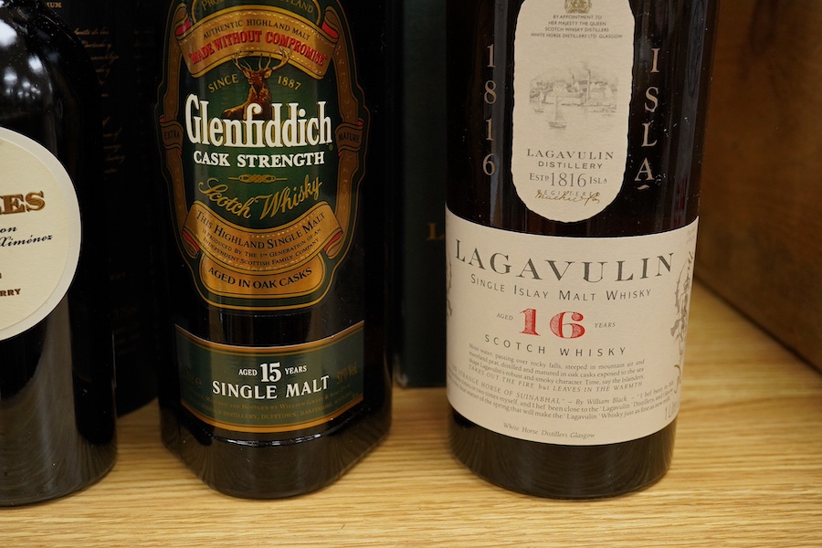 A boxed bottle of Lagavulin single Islay malt whisky, boxed Glenfiddich cask strength single malt whisky, a boxed bottle of Apostoles old sherry and a boxed bottle of Camus Napoleon cognac (4 bottles) Condition - fair, s